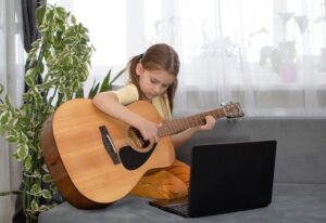 Does My Child Need a Guitar Strap? - Lessons In Your Home