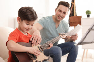 Why Learning Guitar at the Same Time as Your Kids Is a Great Idea